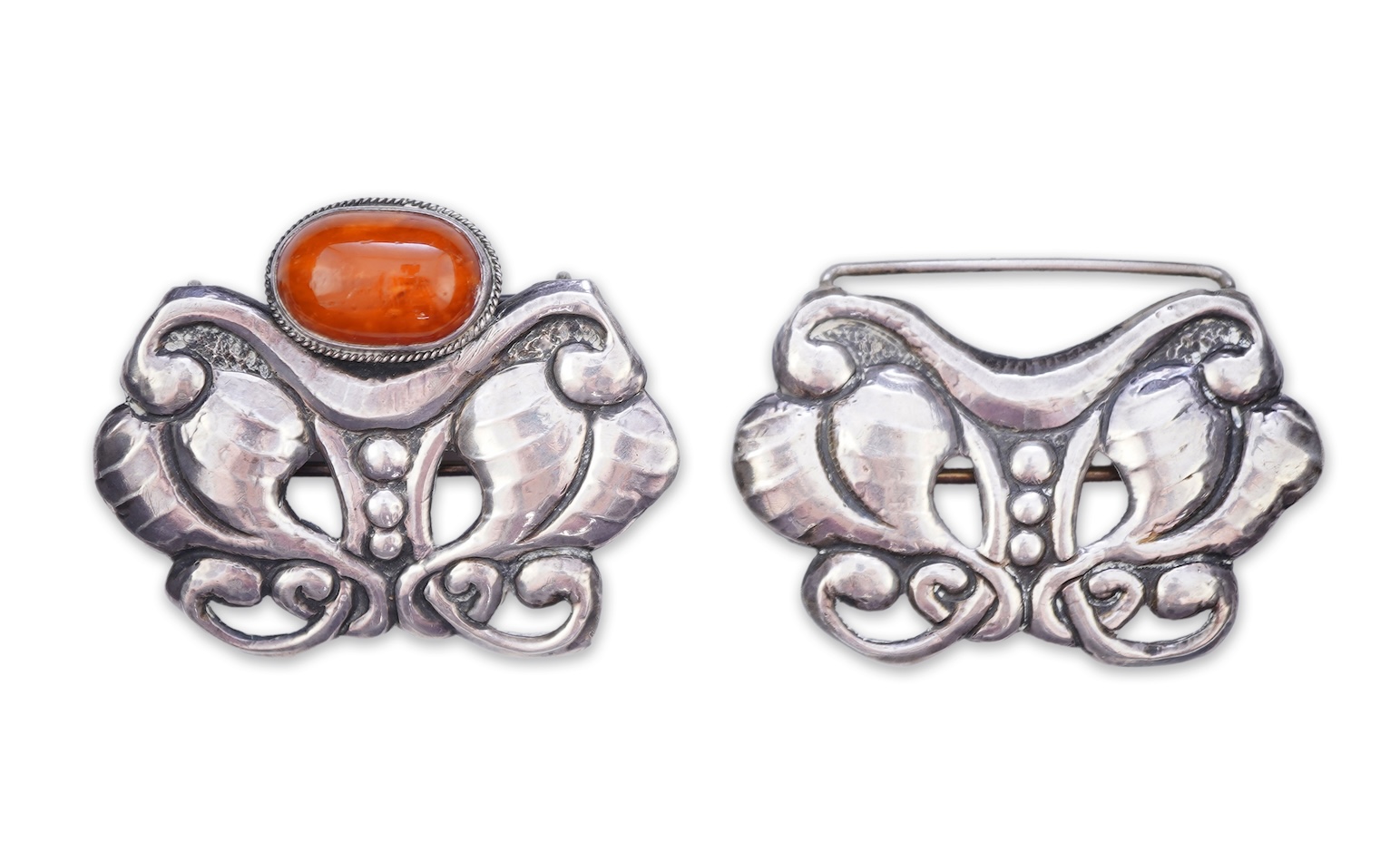 An Arts & Crafts silver and amber buckle, Denmark, early-mid 20th century